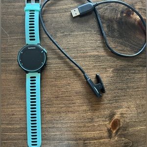 Garmin Forerunner 235 Smartwatch with new band and charger